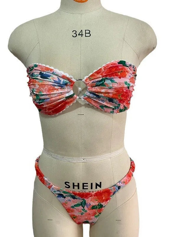 Floral print lace trim bikini top in blue, with matching short, shown on a mannequin.
