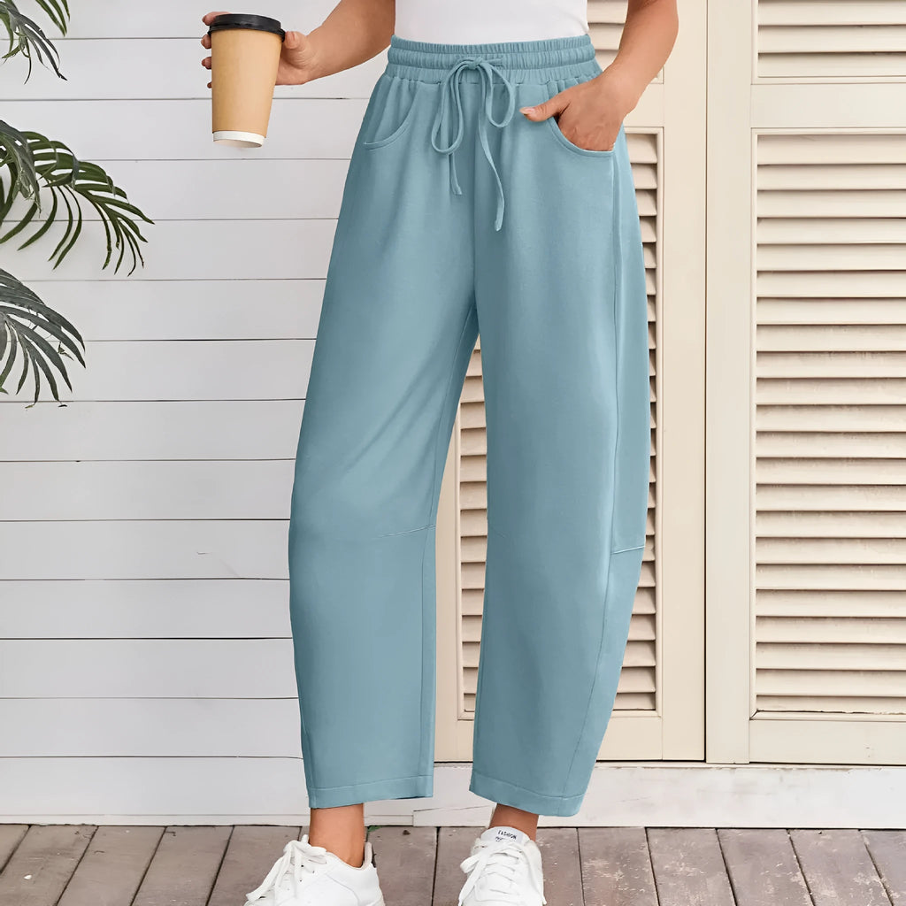 Loose-fit cropped sweatpants with drawstring waistband and side pockets in multiple colour options