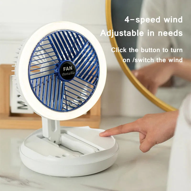 USB charging foldable table fan with LED light and 300-degree rotation on a desk