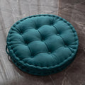 Round floor cushion in dark red showing 60cm diameter polyester futon style