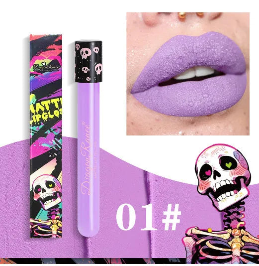 Halloween creative makeup lip gloss in skull-shaped test tube showing matte gold and silver shades.