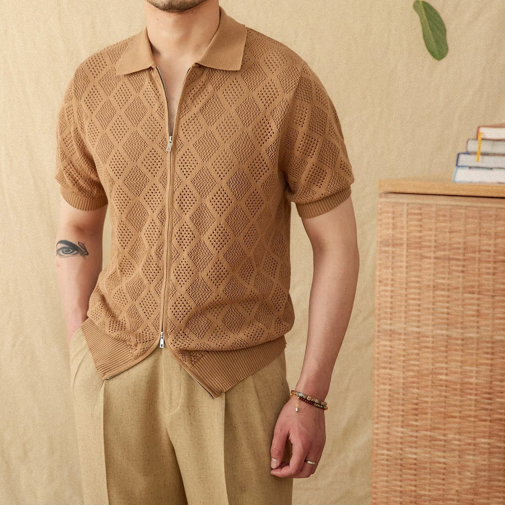 Light brown cotton cardigan with front zip and lapel collar on a hanger
