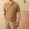 Light brown cotton cardigan with front zip and lapel collar on a hanger