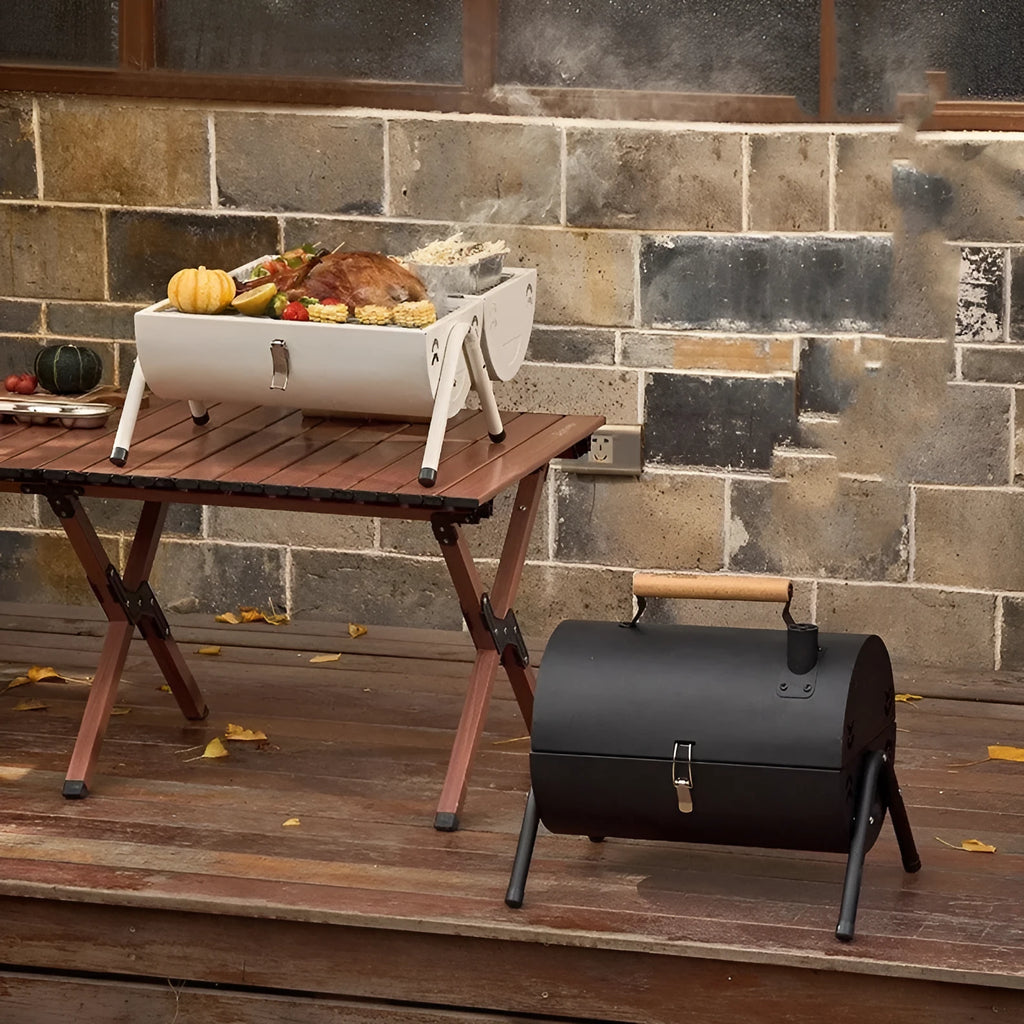 White portable charcoal barbecue grill oven with round chimney design for outdoor cooking