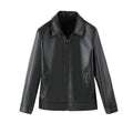 Black men's loose fit PU leather jacket with zipper pockets on a model.