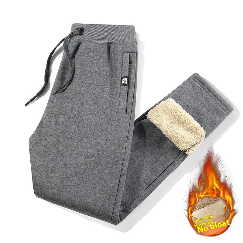 Men's gray fleece-lined oversized cotton track pants with a mid waist and straight leg