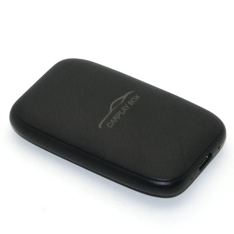 Compact wireless CarPlay adapter with Type-C interface and plastic housing, 50x80x12mm
