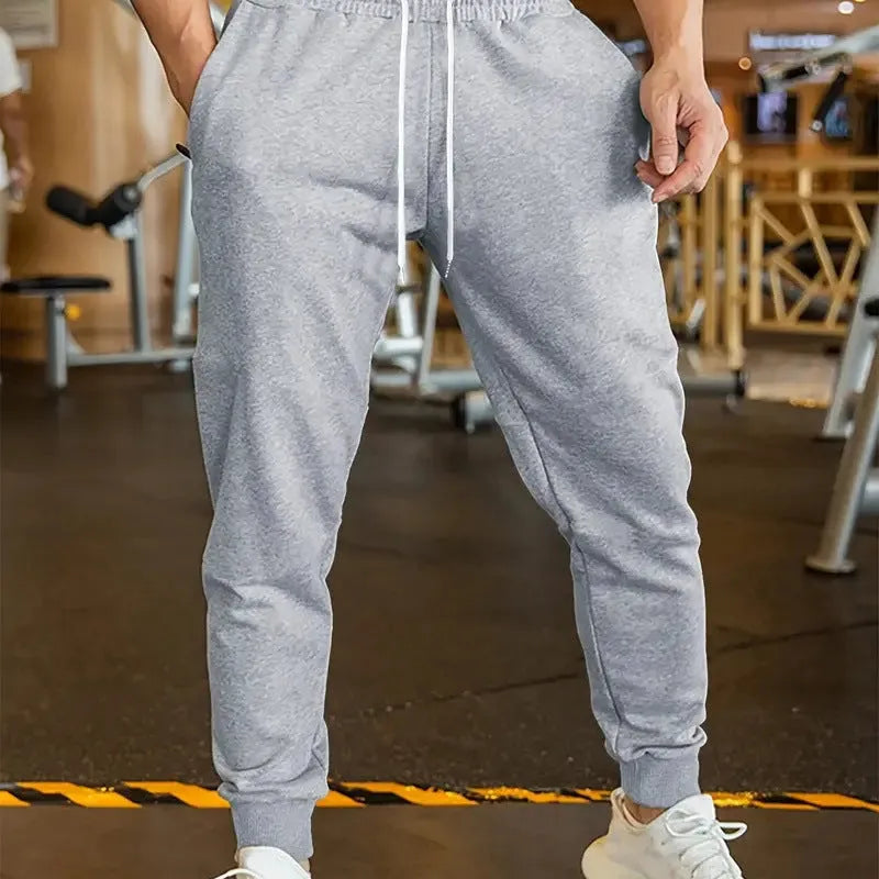 Men's linen leisure trousers in loose fit with elastic lace waist and drawstring, shown in colour option G52P064.