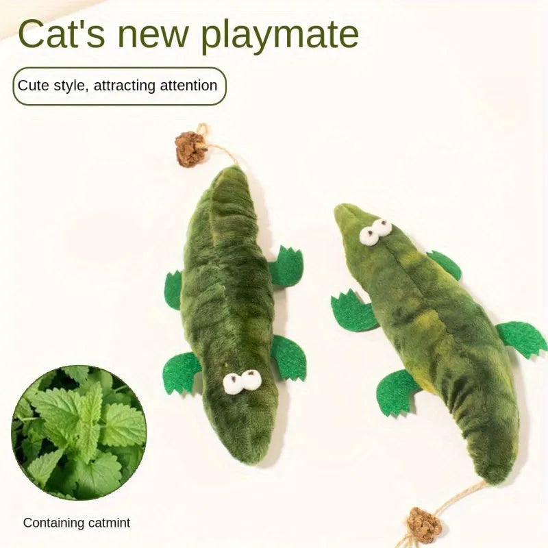 Green plush alligator cat toy with plant-based catnip and peppermint scent for oral cleansing