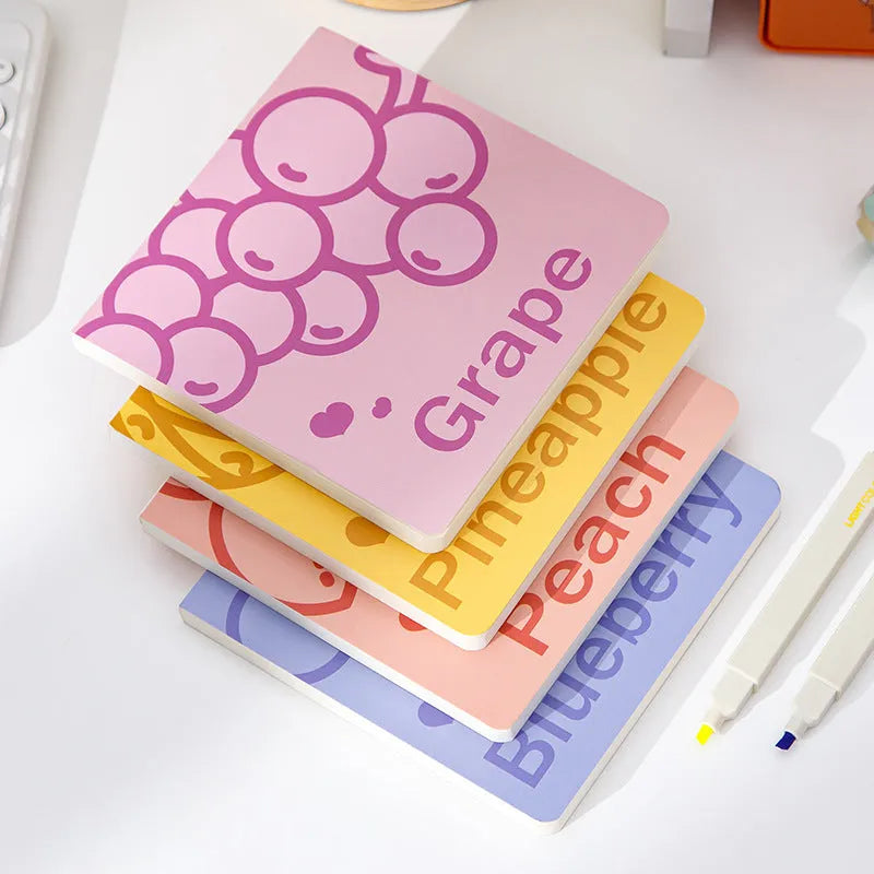 Square fruit pattern notebook with colour embossed cover showing pineapple design, 14.5cm dimensions