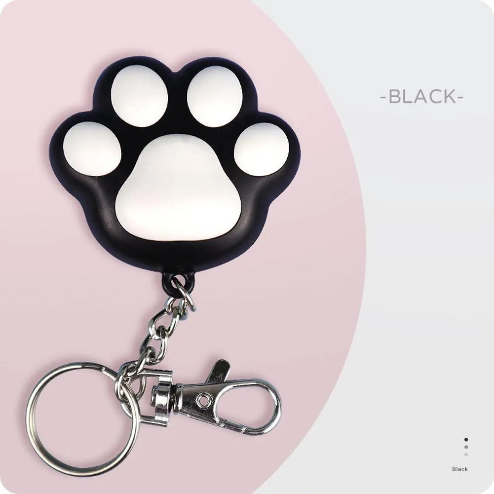Infrared cat teaser toy with key chain lighting function in black or pink plastic construction