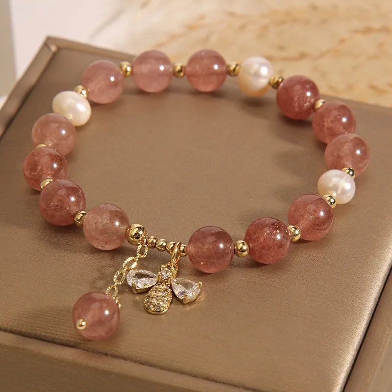 Women's strawberry quartz and freshwater pearl bracelet with bee charm and zircon accents