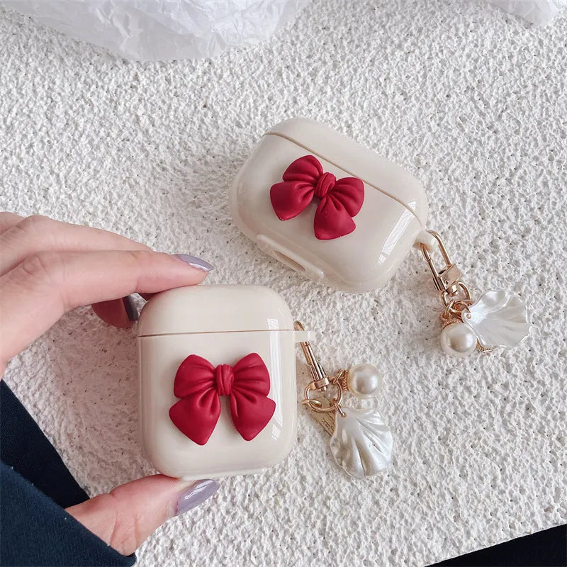 Beige red bow shell TPU clamshell case for AirPods 1, 2, 3 and Pro wireless earphones