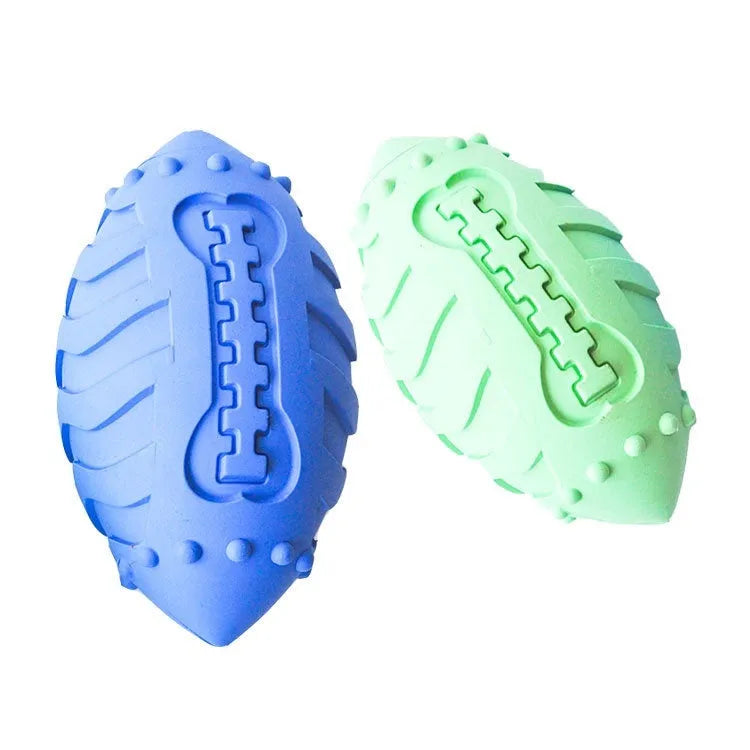 Light green bite-resistant rubber rugby ball dog toy with vocal feature for teeth cleaning and training.