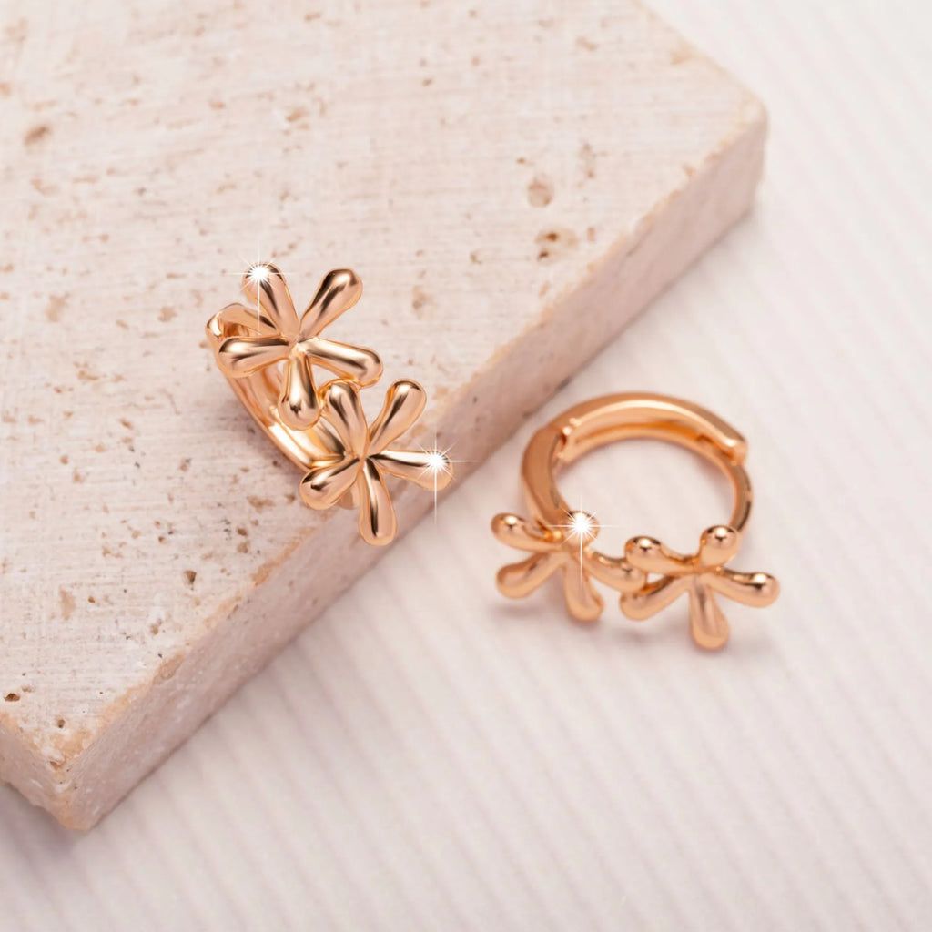 Circular rose gold electroplated earrings with waterdrop flower design for women