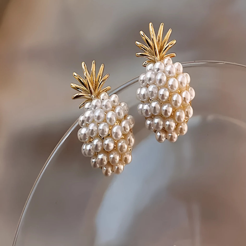 Korean style women's pineapple starfish pearl drop earrings with alloy electroplated finish and gem stone inlay.