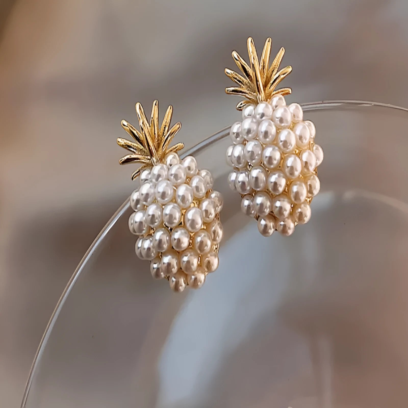 Korean style women's pineapple starfish pearl drop earrings with alloy electroplated finish and gem stone inlay.