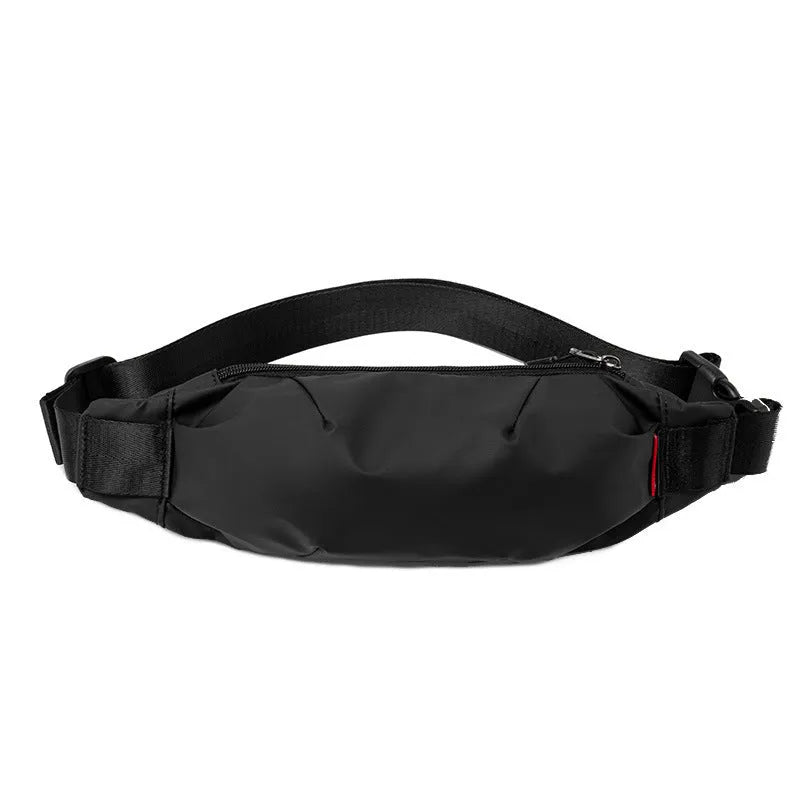 Black Oxford cloth waist pack showing front zipper and compact rectangular shape.