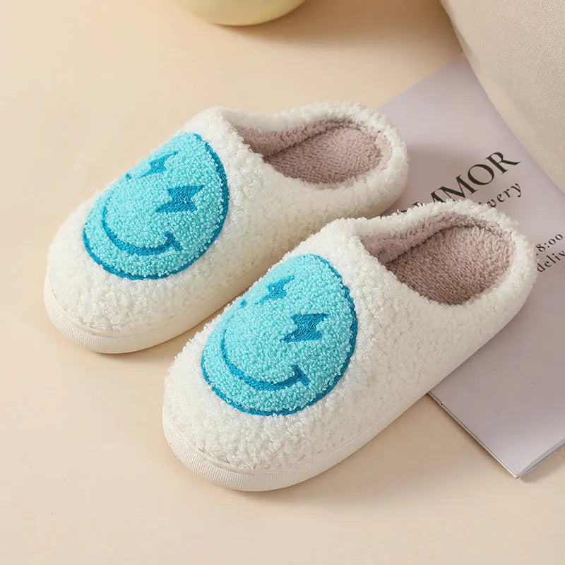 Women's plush cartoon love style home slippers with a round toe and non-slip PVC sole.