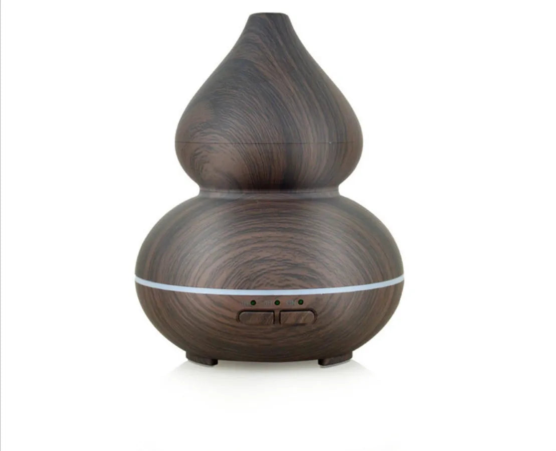 Ultrasonic aromatherapy humidifier 150ml wood grain perfume machine with dark wood finish on table