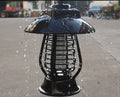 Black solar powered electronic mosquito lamp with solar panel and LED lights for garden pest control