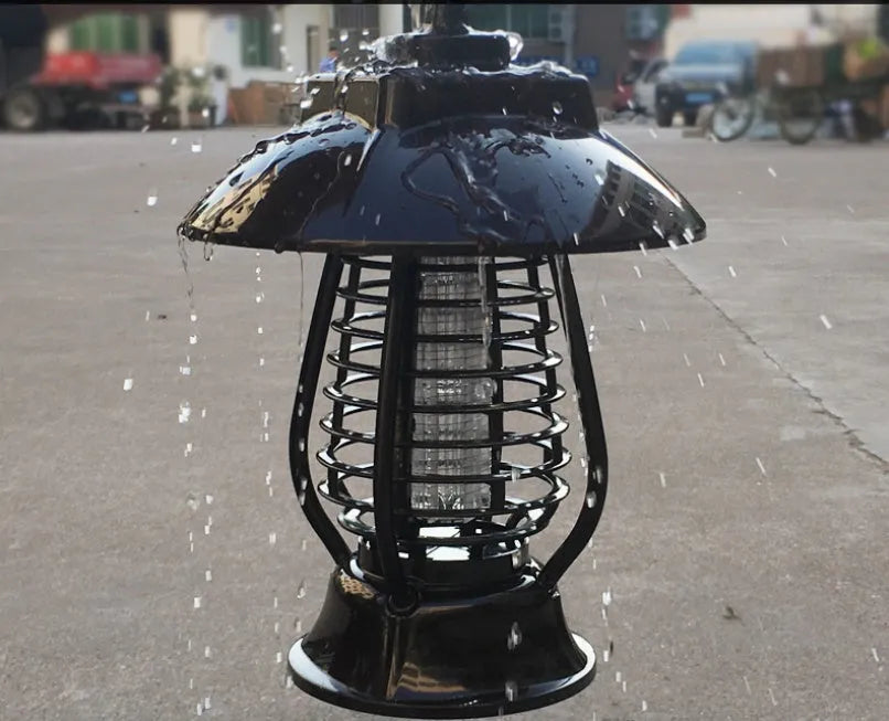 Black solar powered electronic mosquito lamp with solar panel and LED lights for garden pest control