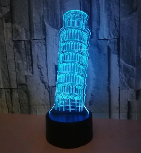 Leaning Tower of Pisa 3D acrylic night light illuminating in multiple colours on a desk