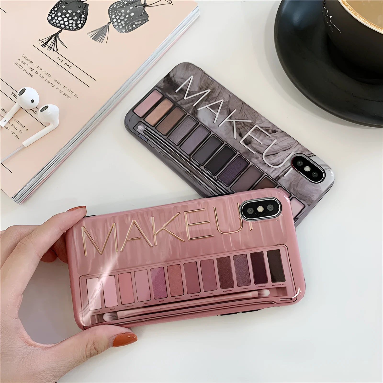 Silicone phone case with eye shadow design for iPhone, shown in flesh and grey colours.