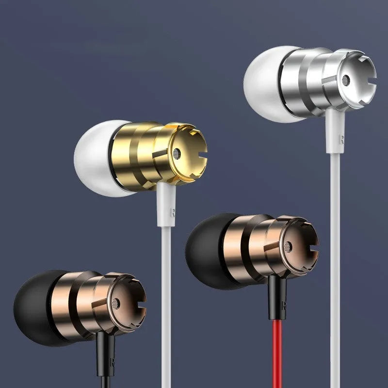 Metal turbo in-ear wired headphones with 3.5mm plug and microphone on a surface