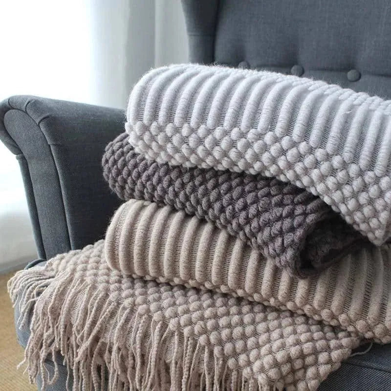 Small polyester nap blanket in dark grey, khaki, or light grey measuring 127x170cm