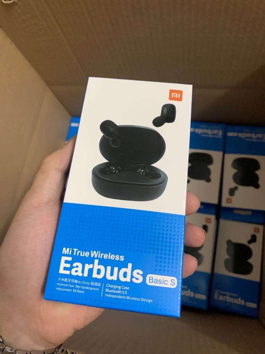 Black Redmi AirDots 2 true wireless Bluetooth earphones with charging case.
