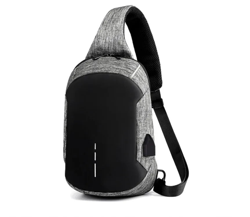 Small dark blue oxford cloth waterproof chest bag with a single strap, shown with the zipper open.