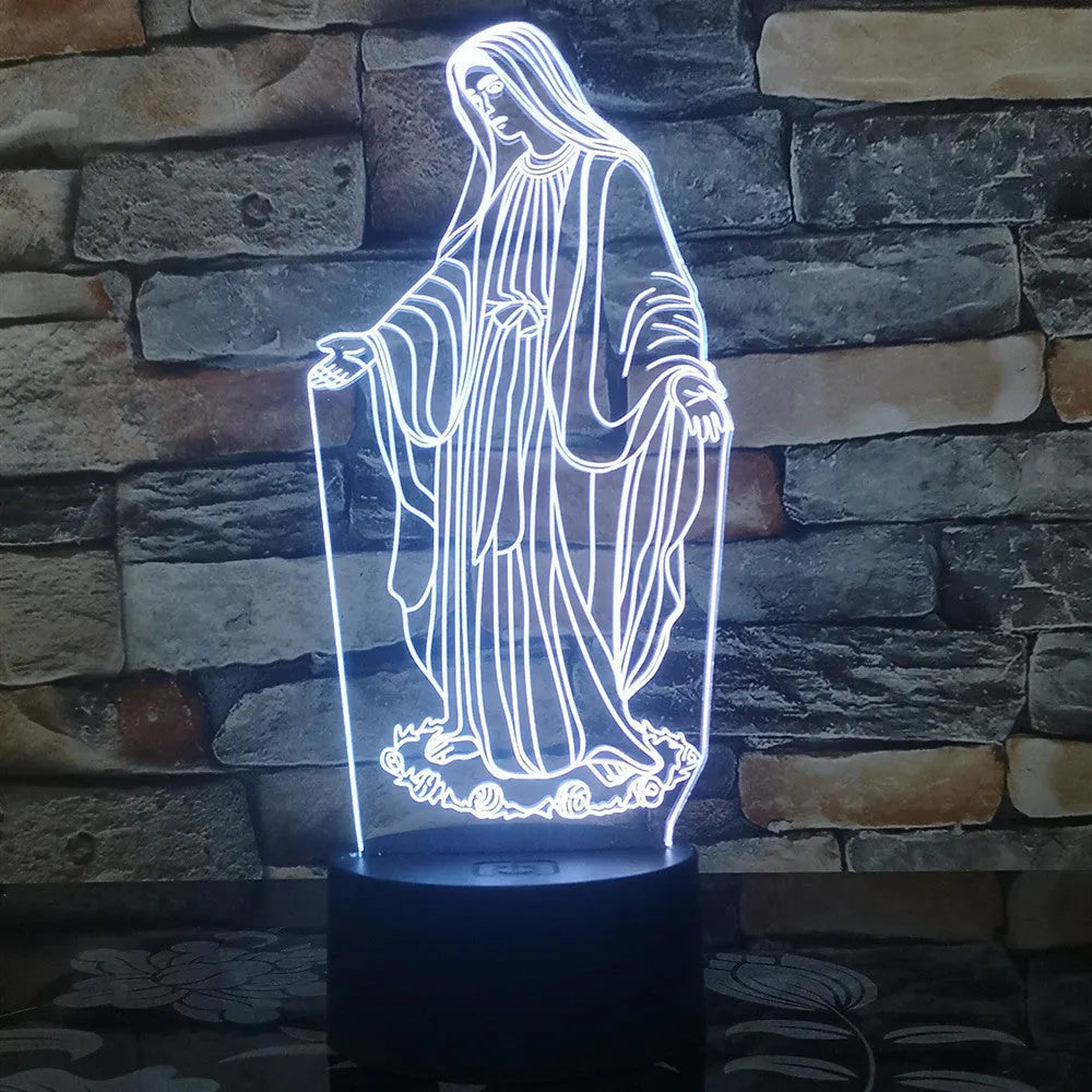 3D LED kids night light with colourful ring pattern, USB cable, and touch-sensitive base on a table.