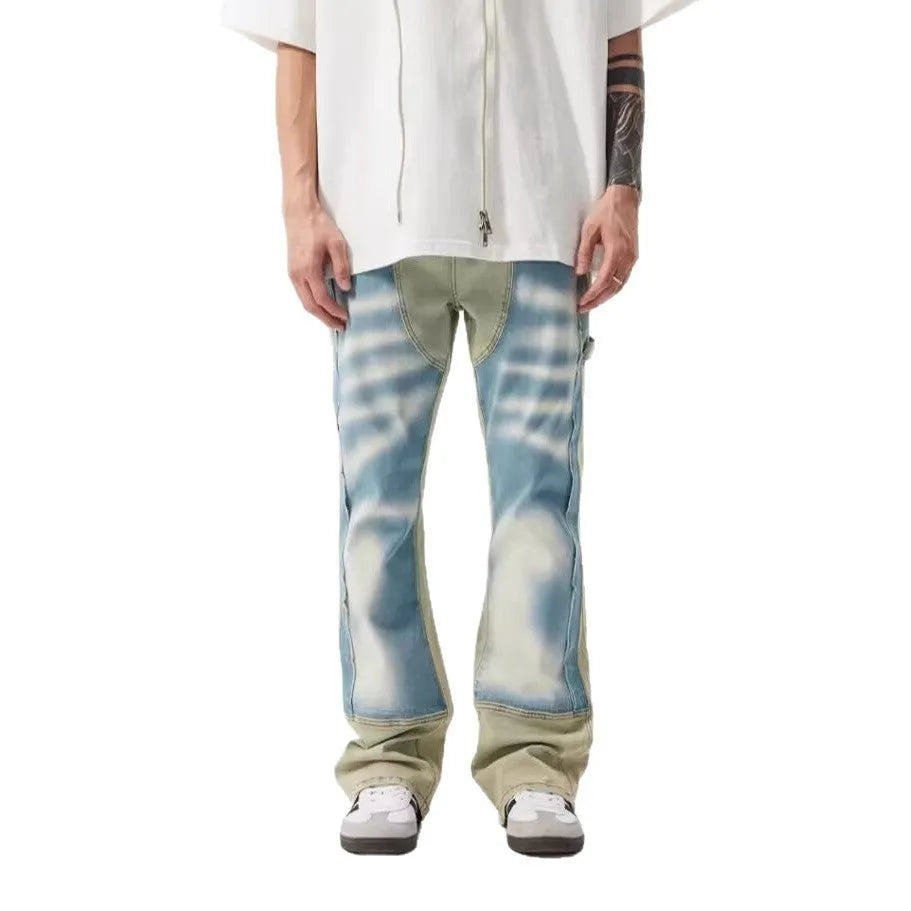 Retro yellow and blue patchwork jeans with splash-ink damaged design detail