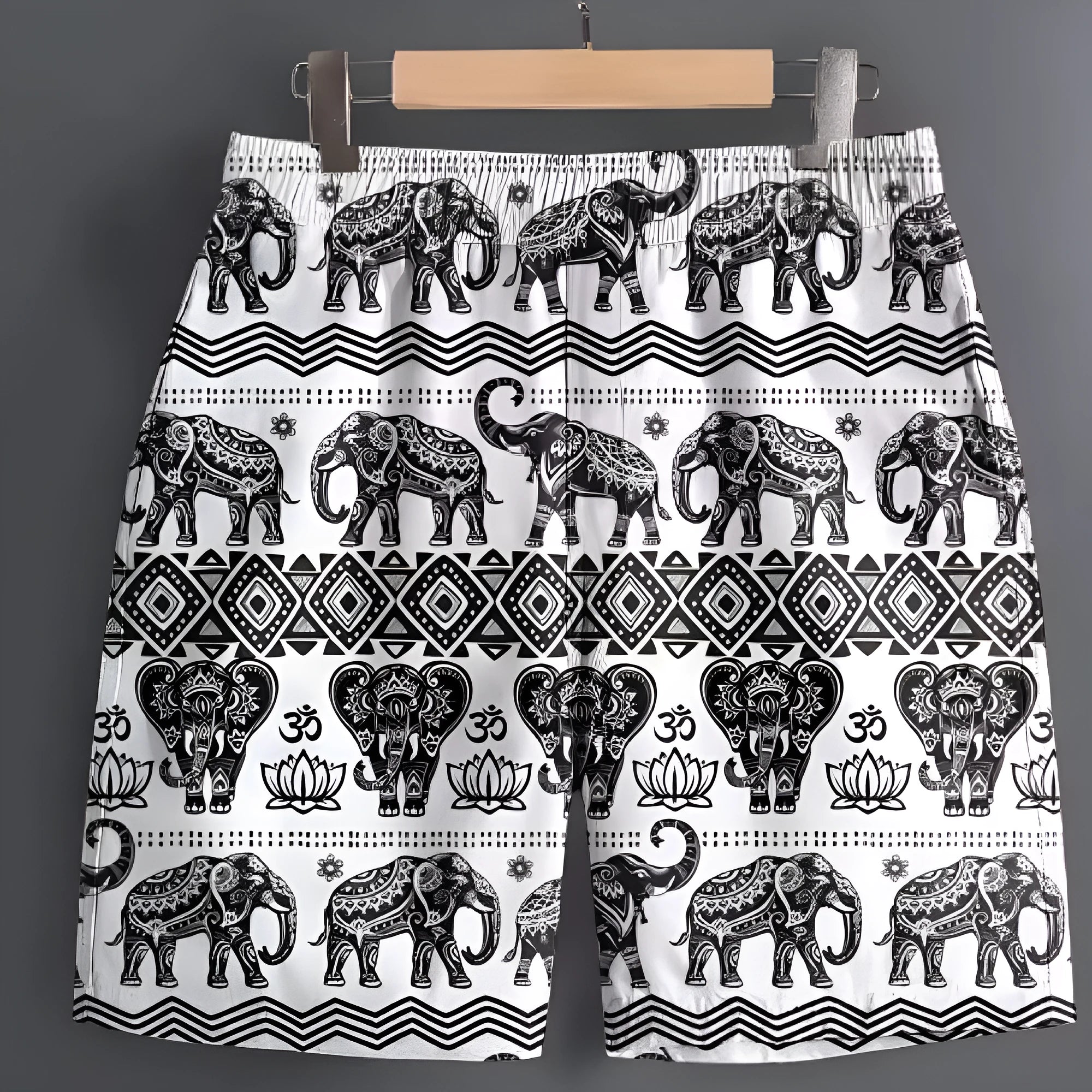Men's patterned polyester sports shorts on a hanger, showing camouflage and stripe design options.