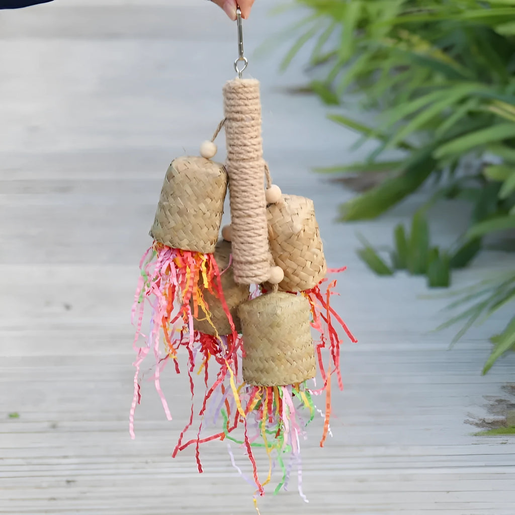 Colourful wooden parrot shredding toy with sisal fibre, measuring 15cm by 35cm.