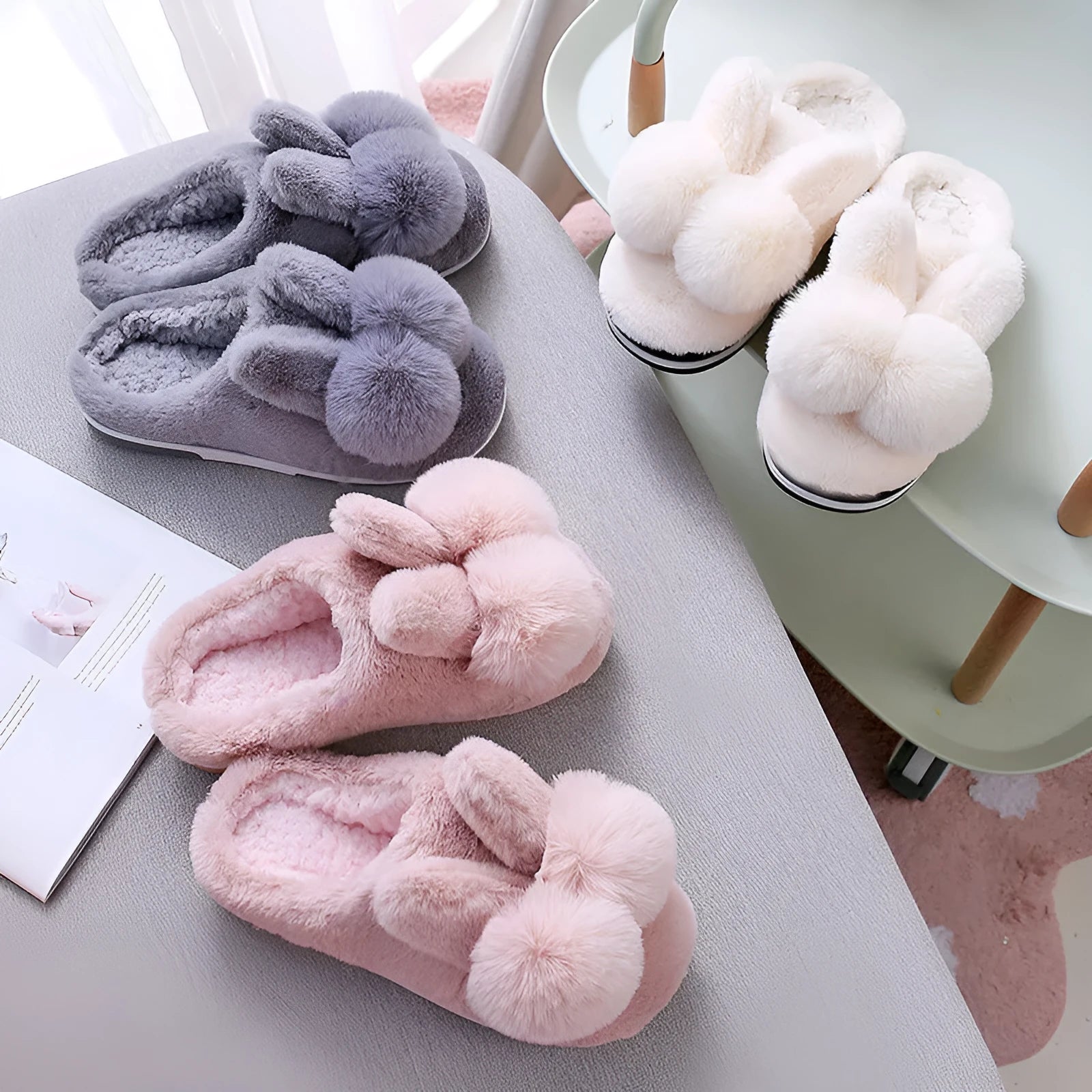 Women's bunny fluffy slippers in rabbit fur, shown in cream colour with floral detail and a sewn sole.