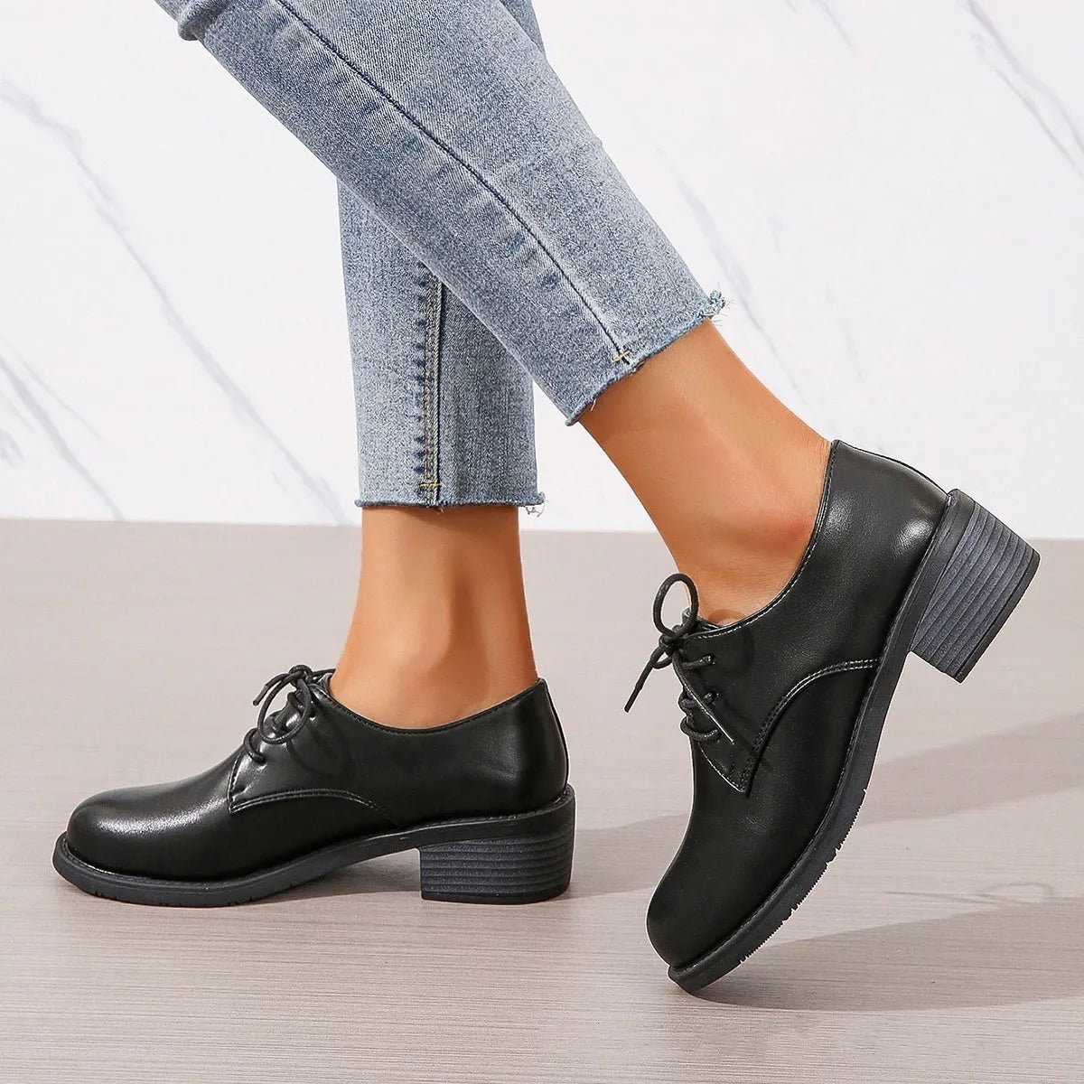 Black women's work shoes with chunky heel and soft sole for professional wear