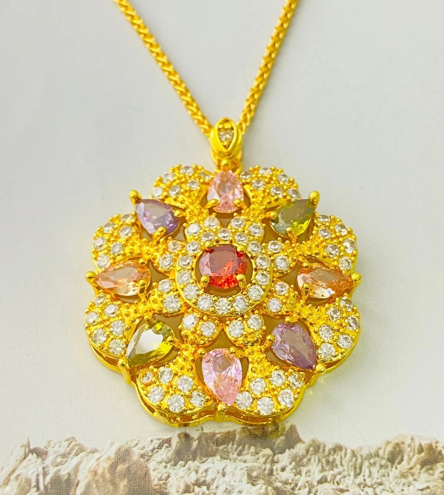 Women's zircon floral pendant necklace with electroplated gold, champagne gold or platinum finish options