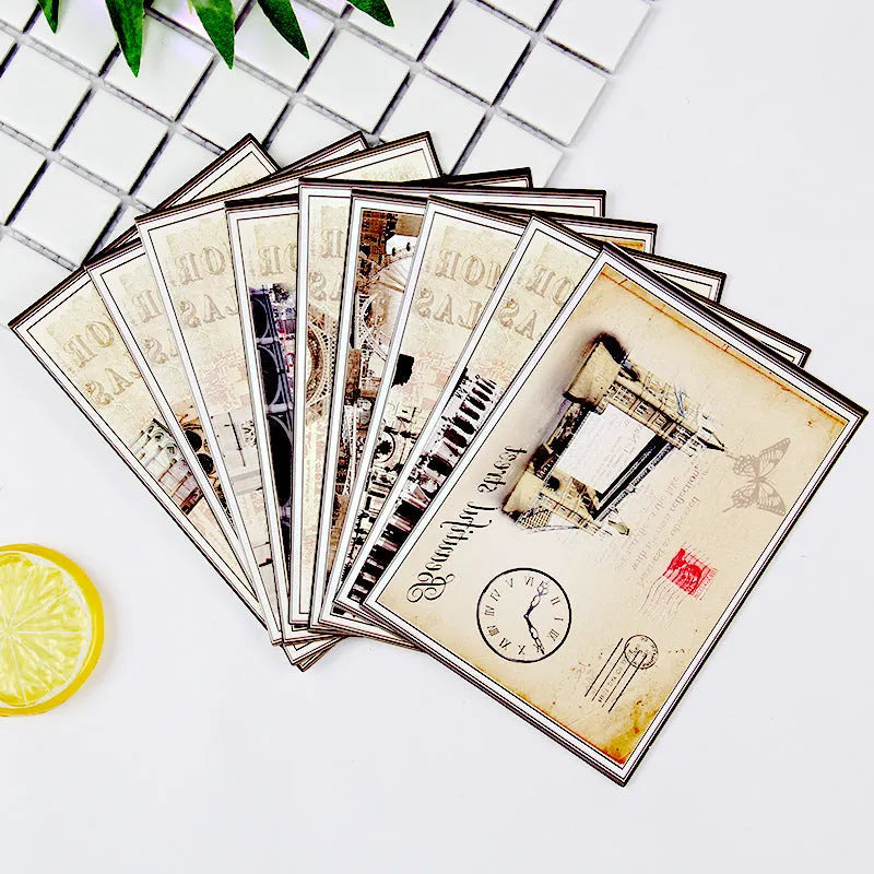 Pack of nine minimalist cartoon-style postcards illustrating retro Paris towers and historic landmarks.