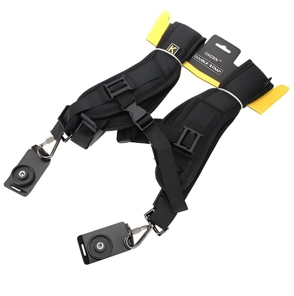 Black professional dual SLR camera harness with shoulder padding shown on a person.