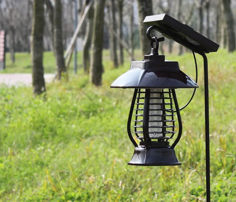 Black solar powered electronic mosquito lamp with solar panel and LED lights for garden pest control