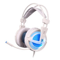 Black and white 7.1 channel USB gaming headset with RGB lights on ear cups and padded headband.