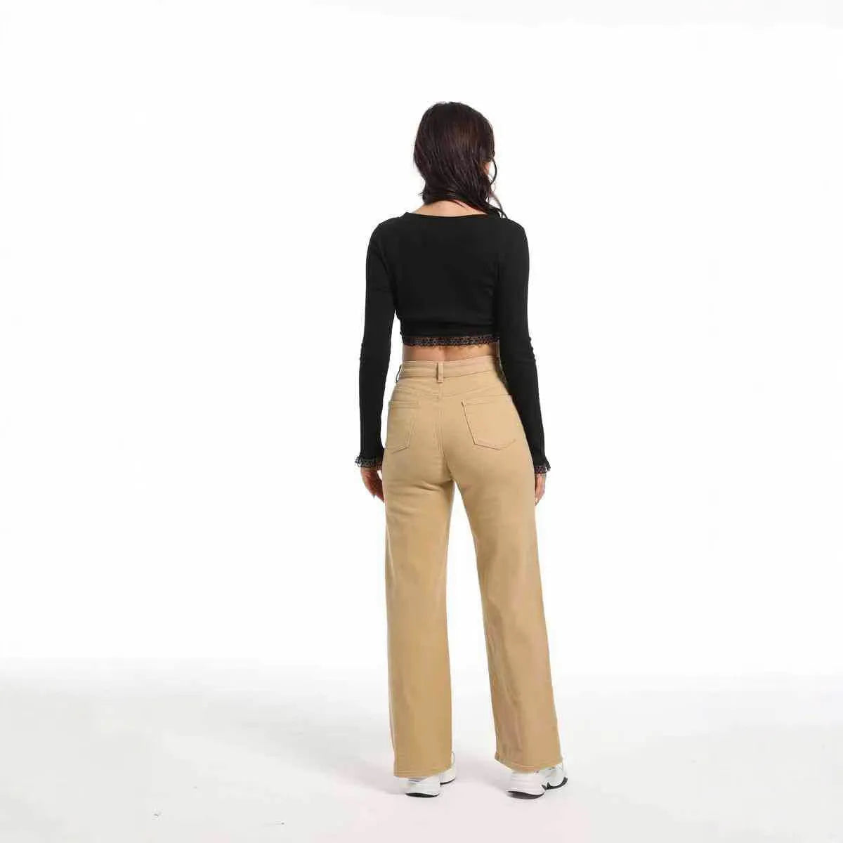 Women's apricot wide leg straight jeans with high waist on a hanger