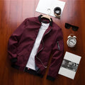 Men's slim-fit casual jacket with zippered side pockets and ribbed cuffs in solid colour