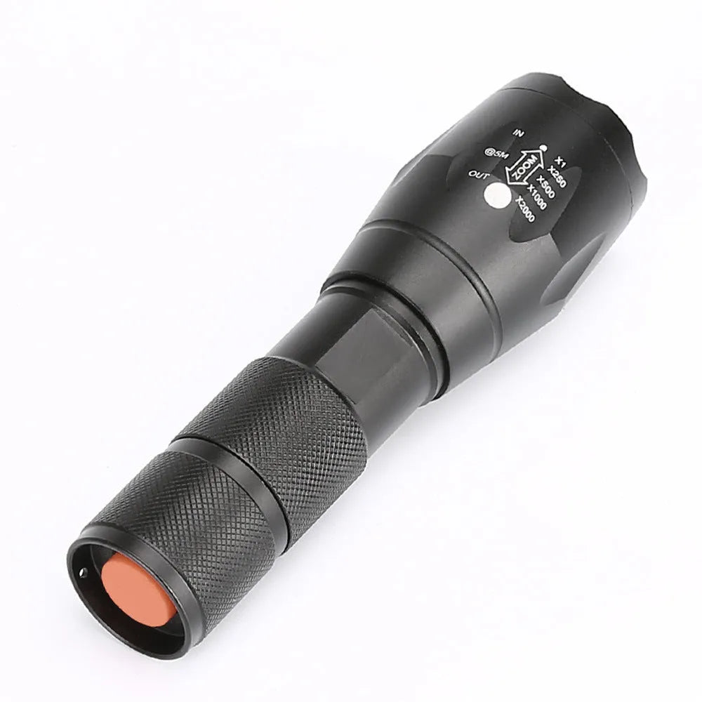 Portable mini LED zoom torch with aluminium alloy body, adjustable focus, and 200-500 metre range in black