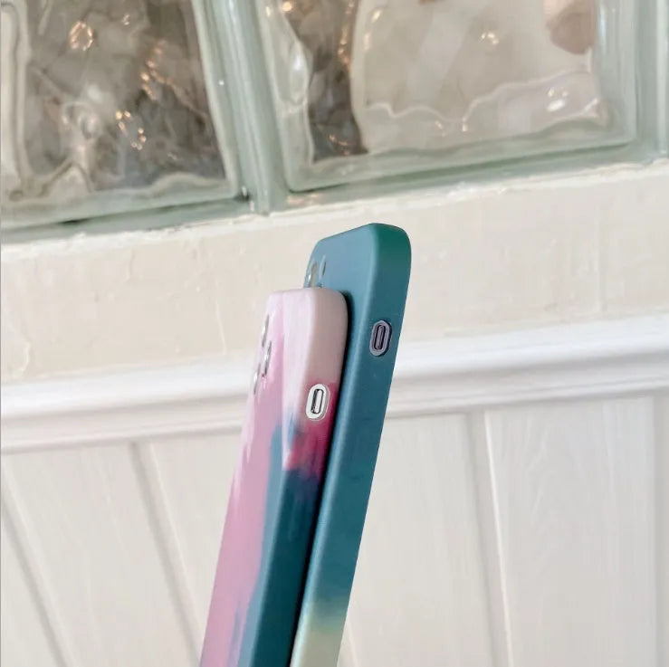 Soft silicone iPhone case with blue and purple gradient geometric abstract pattern.