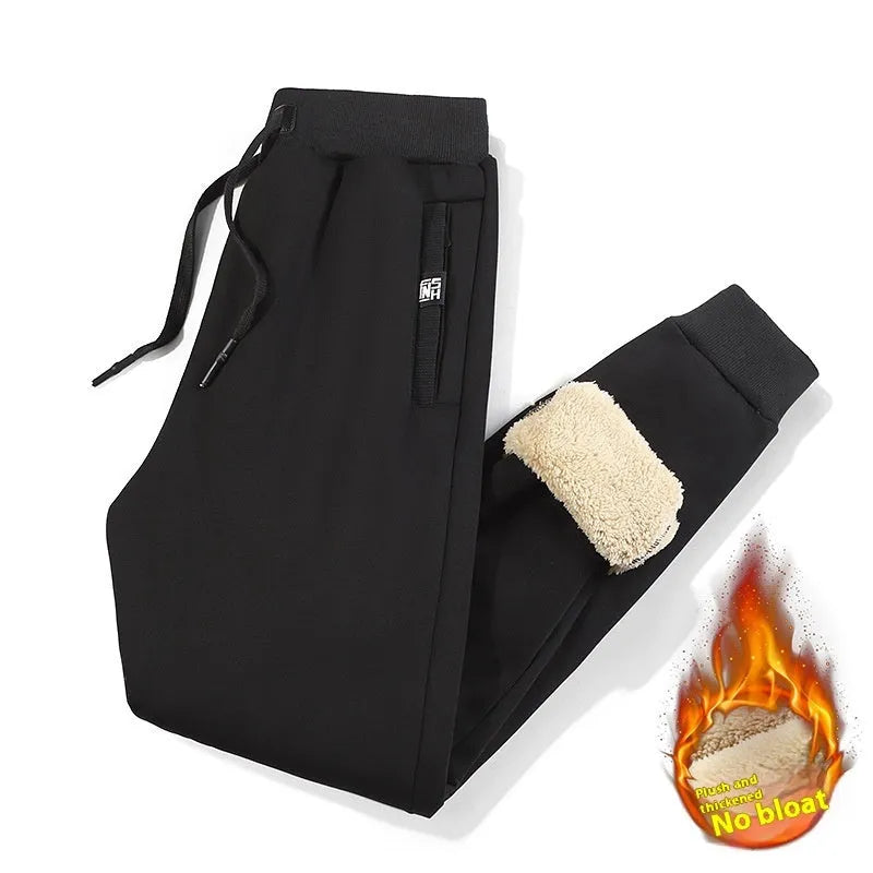 Men's gray fleece-lined oversized cotton track pants with a mid waist and straight leg