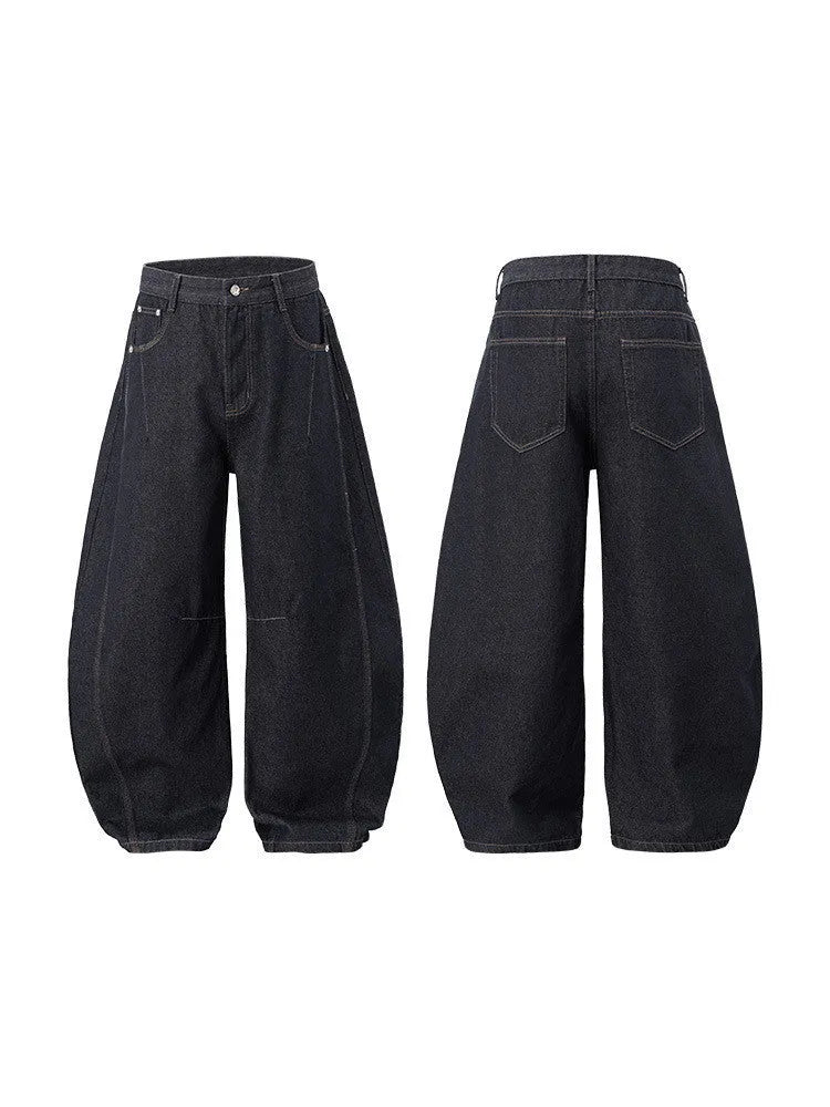 Men's wide leg cotton denim trousers in original cow colour, shown laid flat.