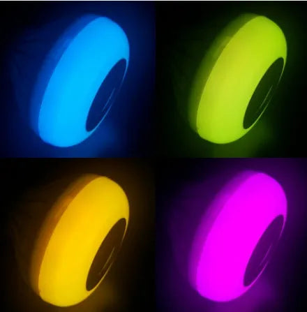 White smart LED bulb with E27 base featuring built-in Bluetooth speaker and remote control for 16 colour lighting.